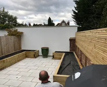 Railway Sleepers, Patio and Batten Fence in Redhill